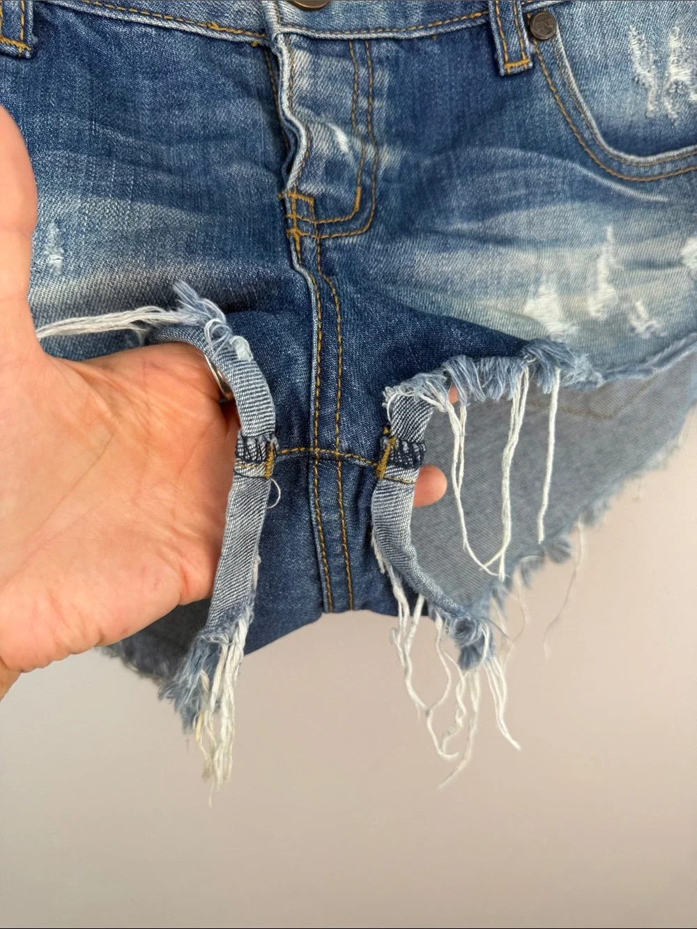 One Teaspoon NO 2’s Low Rise Jean Shorts 8” Rise Raw Curved Hem Sz 25 Distressed